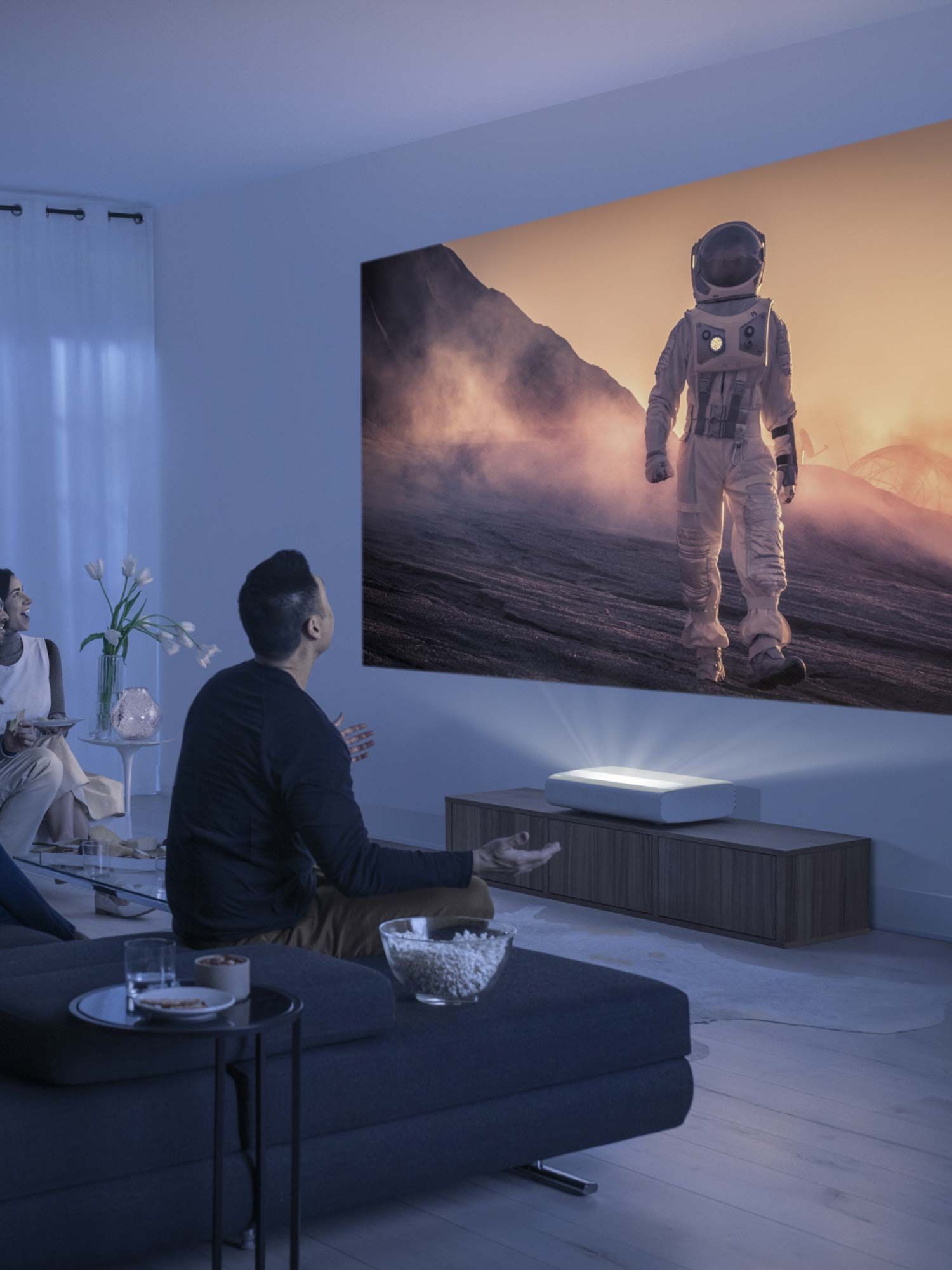 Samsung technology in blue toned room with projector